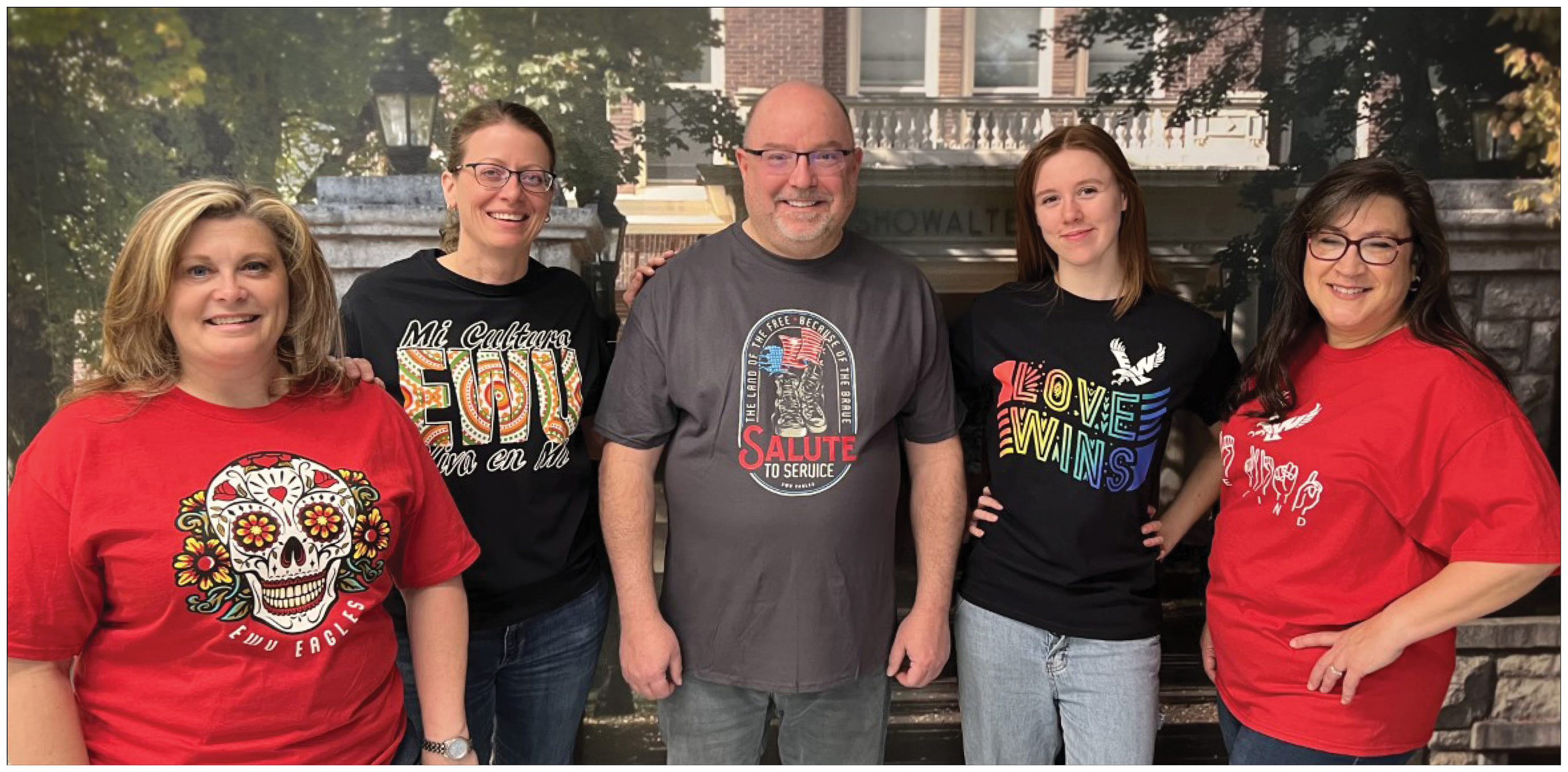 Group of five wearing Specialty T-Shirts in Eagle Store.